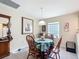 Cozy dining area with natural light is the perfect spot for casual Gathering meals at 7340 Sw 111Th Ln, Ocala, FL 34476