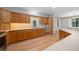 Well-lit kitchen featuring oak cabinets, neutral countertops, and stainless steel appliances at 7810 Sw 186Th Cir, Dunnellon, FL 34432