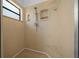 Walk-in shower with a bench and window at 7810 Sw 186Th Cir, Dunnellon, FL 34432