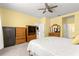 Bedroom featuring traditional furnishings and decor, a ceiling fan, and natural lighting at 8861 Sw 63Rd Ct, Ocala, FL 34476