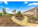 Professionally landscaped yard featuring decorative rock and diverse plantings at 8861 Sw 63Rd Ct, Ocala, FL 34476