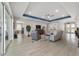 Open-concept living room featuring recessed lights, a ceiling fan, and luxury vinyl flooring at 8864 Sw 85Th Loop, Ocala, FL 34481