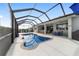 This stunning screened-in pool area is perfect for cooling off during those hot summer days at 8864 Sw 85Th Loop, Ocala, FL 34481