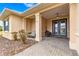 Inviting covered front porch with seating area, perfect for relaxing and enjoying the neighborhood at 9085 Sw 89Th Loop, Ocala, FL 34481