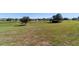 Wide open backyard space with views of the golf course and community at 9167 Sw 99Th Court Rd, Ocala, FL 34481