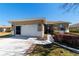 Lovely home showcasing a charming front entryway and a manicured flowerbed at 9167 Sw 99Th Court Rd, Ocala, FL 34481