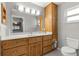 Bathroom featuring a white counter and wooden cabinets with good light at 9335 Sw 85Th Ter # A, Ocala, FL 34481