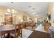 Comfortable living room features neutral colored walls, tile floors and arched opening to the kitchen at 9335 Sw 85Th Ter # A, Ocala, FL 34481