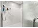 Modern shower with white tile and glass door at 9335 Sw 85Th Ter # A, Ocala, FL 34481