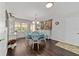 Bright dining room with a white hutch and views of the outdoors at 9348 Sw 82Nd Ter # C, Ocala, FL 34481