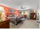 Spacious main bedroom with a ceiling fan and carpet at 9348 Sw 82Nd Ter # C, Ocala, FL 34481