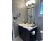 Bathroom with a vessel sink vanity, chrome fixtures, framed mirror and modern decor at 9535 Sw 85Th Ter # C, Ocala, FL 34481