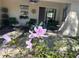 Paver patio with outdoor seating and a sliding glass door at 9535 Sw 85Th Ter # C, Ocala, FL 34481