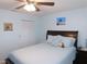 Cozy bedroom showcasing a comfortable bed, soft lighting, and ample closet space at 9652 Sw 84Th Ter # C, Ocala, FL 34481