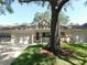 A charming one-story villa with attached garages, a welcoming front porch, and a beautifully maintained lawn and landscaping at 9652 Sw 84Th Ter # C, Ocala, FL 34481