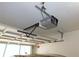 Garage interior featuring a Craftsman 1/2 HP garage door opener and support frame at 9652 Sw 84Th Ter # C, Ocala, FL 34481