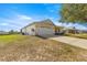 Charming single-story home featuring an attached two-car garage, front porch, and well-maintained landscaping at 9866 Sw 97Th Ln, Ocala, FL 34481