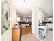 Bright entryway with a view into the living room and kitchen showcases the open floor plan at 9983 Sw 90Th Loop, Ocala, FL 34481