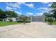 Charming single-story home with well-manicured lawn and attached two-car garage at 10821 Sw 87Th Ter, Ocala, FL 34481