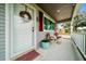 Inviting front porch with stylish seating at 10821 Sw 87Th Ter, Ocala, FL 34481