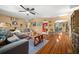 Spacious living room with hardwood floors, perfect for entertaining guests and spending time with Gathering at 10821 Sw 87Th Ter, Ocala, FL 34481