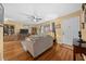 Spacious living room with hardwood floors, providing a warm and inviting atmosphere at 10821 Sw 87Th Ter, Ocala, FL 34481