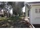 A beautiful backyard with mature trees providing shade and a serene outdoor setting at 11091 Sw 73Rd Ct, Ocala, FL 34476