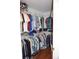 Walk-in closet with organized clothing racks and shelving for optimal storage at 11091 Sw 73Rd Ct, Ocala, FL 34476