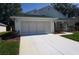 Charming home with a well-maintained garage and inviting curb appeal at 11091 Sw 73Rd Ct, Ocala, FL 34476