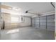 Spacious garage with shelving units for ample storage at 11625 Sw 71St Cir, Ocala, FL 34476