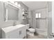 Well-lit bathroom showcasing modern vanity, stylish mirror and a shower-tub combination at 165 Ne 43Rd Ave, Ocala, FL 34470