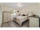 Bright and airy bedroom featuring a large window and neutral decor at 165 Ne 43Rd Ave, Ocala, FL 34470