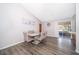 Dining room with modern table, chairs, and a sliding glass door to a patio at 18 Fir Trail Pass, Ocala, FL 34472