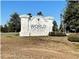 Community entrance sign for 'World Equestrian Estates' with landscaping, indicating a prestigious neighborhood at 2150 Nw 23Rd Loop, Ocala, FL 34475