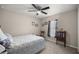 Comfortable bedroom with a ceiling fan and carpeted floors at 22242 Sw Marine Blvd, Dunnellon, FL 34431