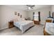 Cozy bedroom with carpet, a ceiling fan, neutral walls, with natural light and comfortable furniture at 22242 Sw Marine Blvd, Dunnellon, FL 34431