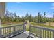 Relaxing backyard deck providing a view of a well-maintained, fenced yard at 22242 Sw Marine Blvd, Dunnellon, FL 34431
