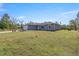 Charming single-story home with well-maintained front yard and a driveway at 22242 Sw Marine Blvd, Dunnellon, FL 34431