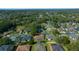 This aerial view showcases the charming neighborhood, blending suburban living with natural surroundings at 2301 Se 24Th Ave, Ocala, FL 34471