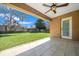 Charming back porch overlooking a lush lawn, perfect for outdoor relaxation and entertainment at 2301 Se 24Th Ave, Ocala, FL 34471