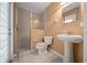 Bathroom features a stand-up shower, toilet and vanity with sink at 2301 Se 24Th Ave, Ocala, FL 34471