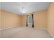 Bedroom with neutral walls and carpeting, a ceiling fan and a window at 2301 Se 24Th Ave, Ocala, FL 34471