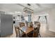 The dining room flows into the renovated kitchen, creating an open and airy atmosphere at 3301 Se 32Nd Ave, Ocala, FL 34471