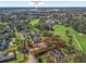 Aerial view of property near the World Equestrian Center surrounded by lush landscaping and golf course at 3848 Nw 85Th Ter, Ocala, FL 34482