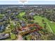 Expansive aerial view of property near the World Equestrian Center, surrounded by lush greenery at 3848 Nw 85Th Ter, Ocala, FL 34482