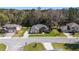 Aerial view of a well-manicured property showcasing its lush landscaping and neighborhood at 4103 Se 10Th Ave, Ocala, FL 34480