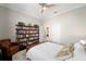 Bright bedroom with built-in bookcase and hardwood floors at 4103 Se 10Th Ave, Ocala, FL 34480