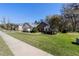 Beautifully landscaped front yard of this home with a stone facade and well-maintained lawn at 4103 Se 10Th Ave, Ocala, FL 34480