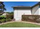 Home exterior with well-maintained landscaping and Generac generator at 4103 Se 10Th Ave, Ocala, FL 34480