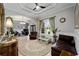 Sitting area with beautiful tray ceiling, large windows, and an archway entrance at 4103 Se 10Th Ave, Ocala, FL 34480